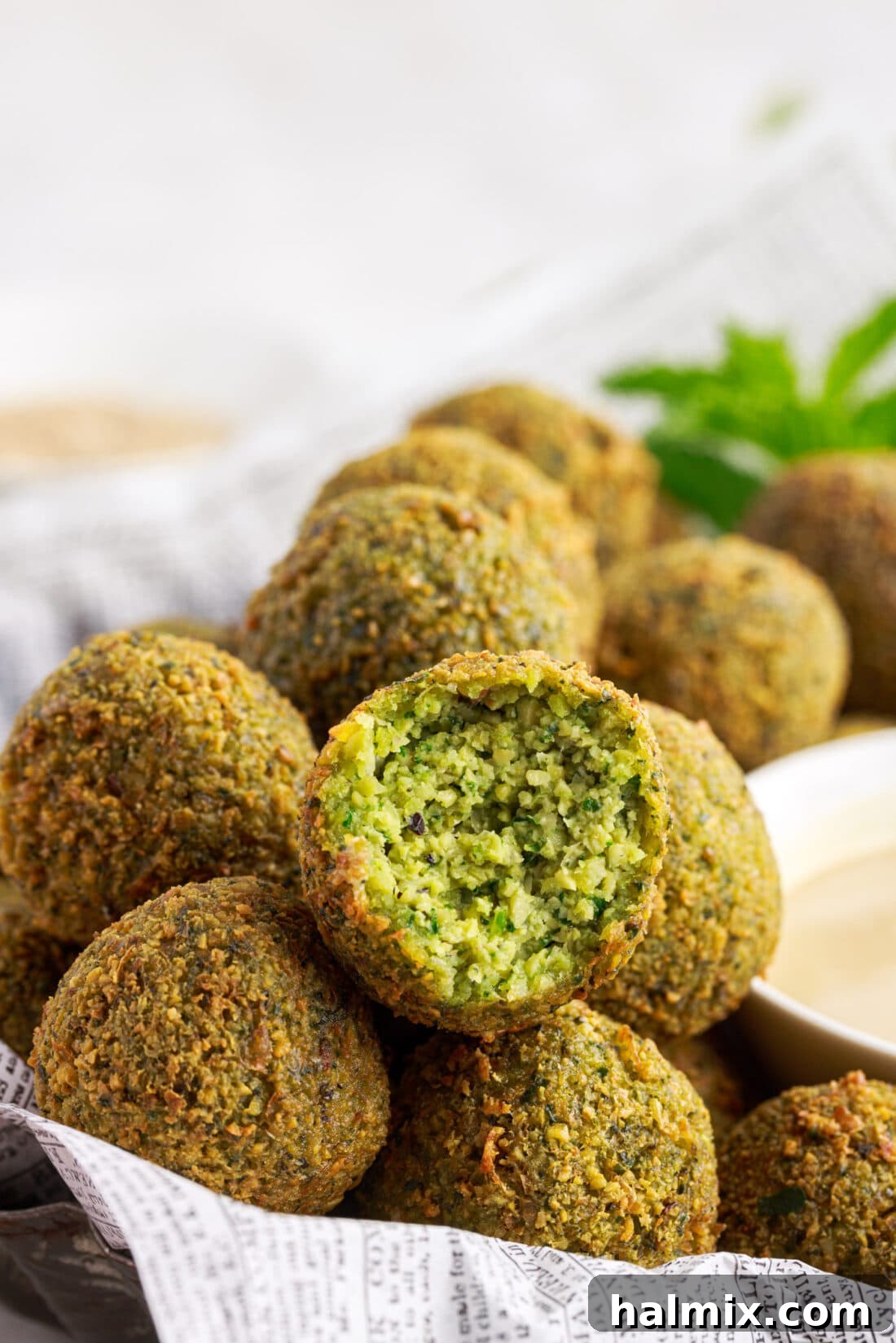 The Golden Chickpea Delight 14 Falafel with a bite out of it