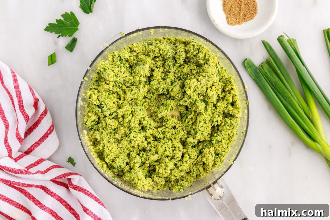 The Golden Chickpea Delight 7 falafel mixture in a food processor