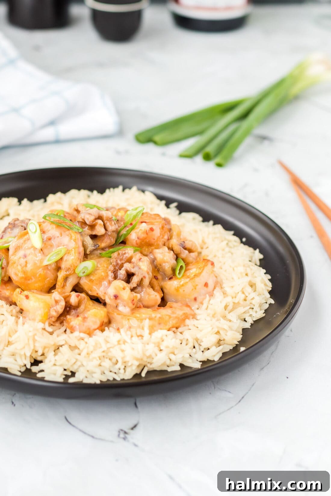 Golden Glazed Honey Walnut Shrimp 3 Plate of Honey Walnut Shrimp served with white rice, showcasing a complete meal