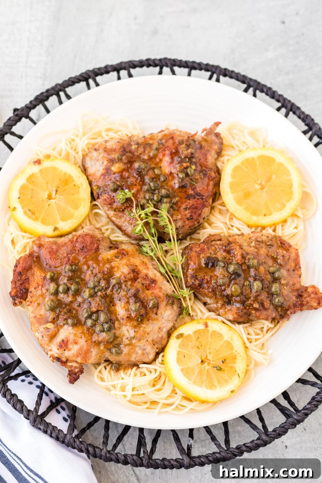 Tender Veal Cutlets with Lemon Caper Sauce 3 plate of Veal Piccata with lemons