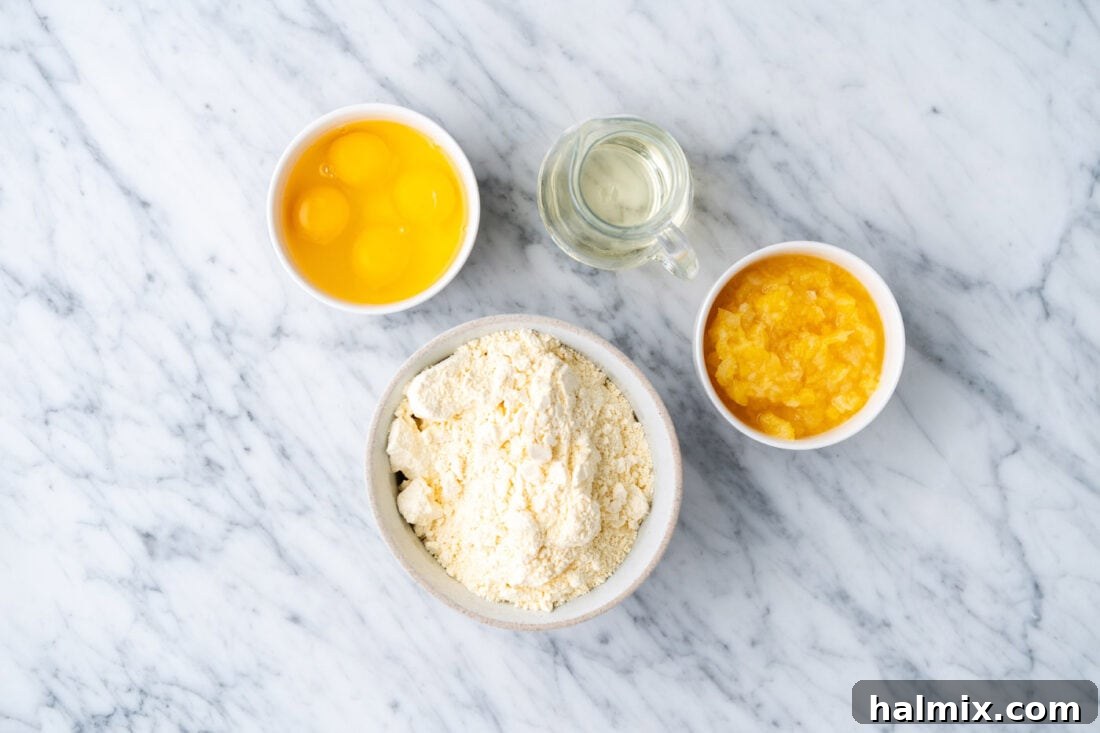 Sun-Kissed Pineapple Dream 4 a collection of cake ingredients, including eggs, oil, yellow cake mix, and a can of crushed pineapple