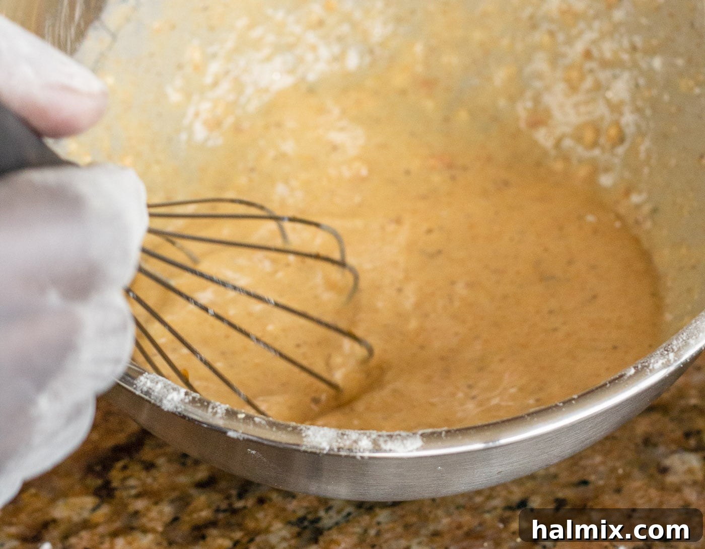 The prepared cornmeal and egg mixture, ready for dipping the shrimp.