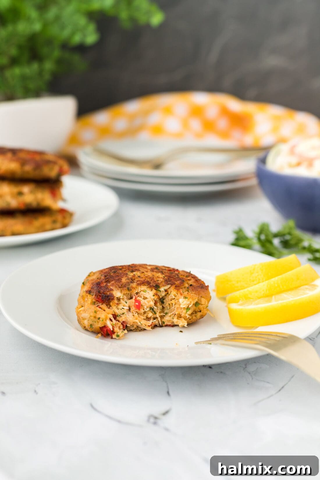 Golden Crab Delights 8 Crab Cake with a bite removed