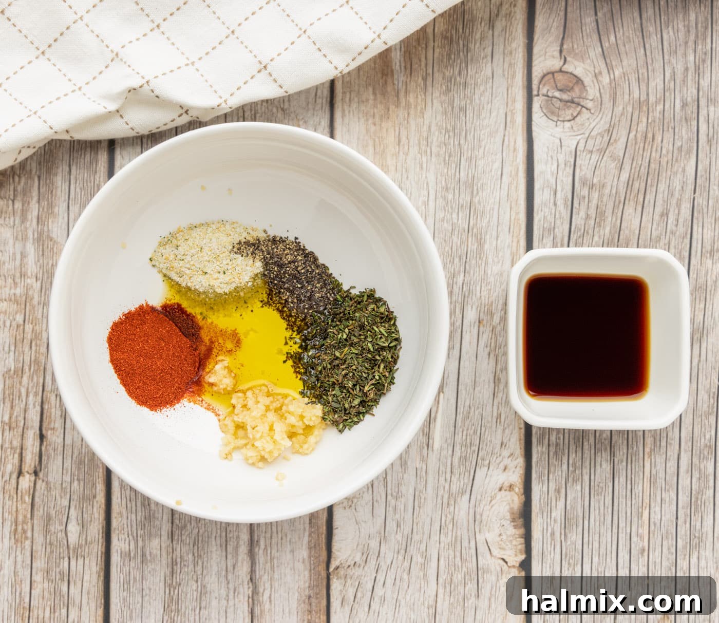 A bowl containing the mixed seasoning blend for lamb chops, ready to be applied
