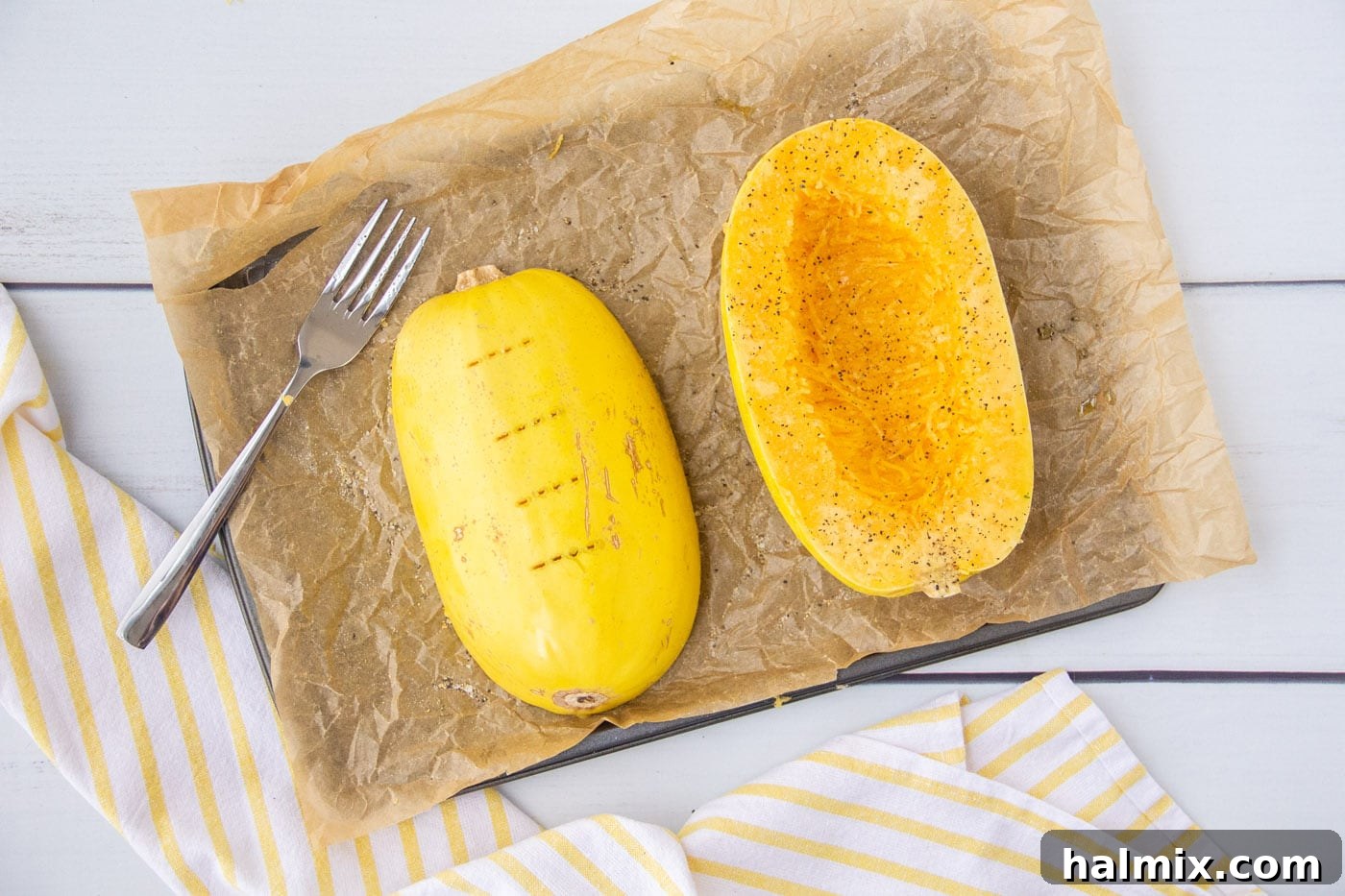 piercing spaghetti squash with a fork
