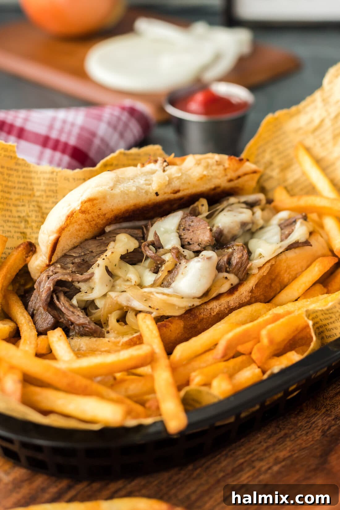 The Quintessential Philly Steak Sandwich 3 Philly Cheese Steak sandwich in basket