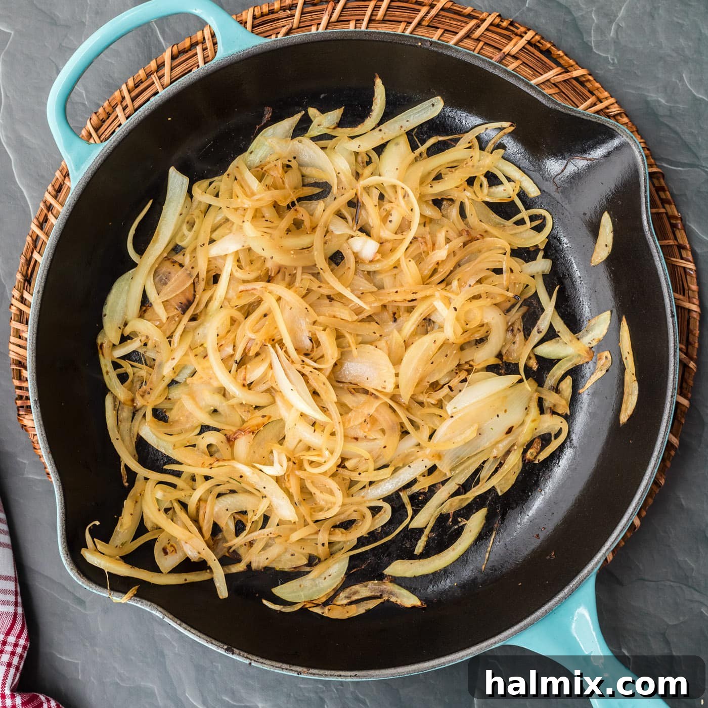 The Quintessential Philly Steak Sandwich 8 sauteed onions in a pan