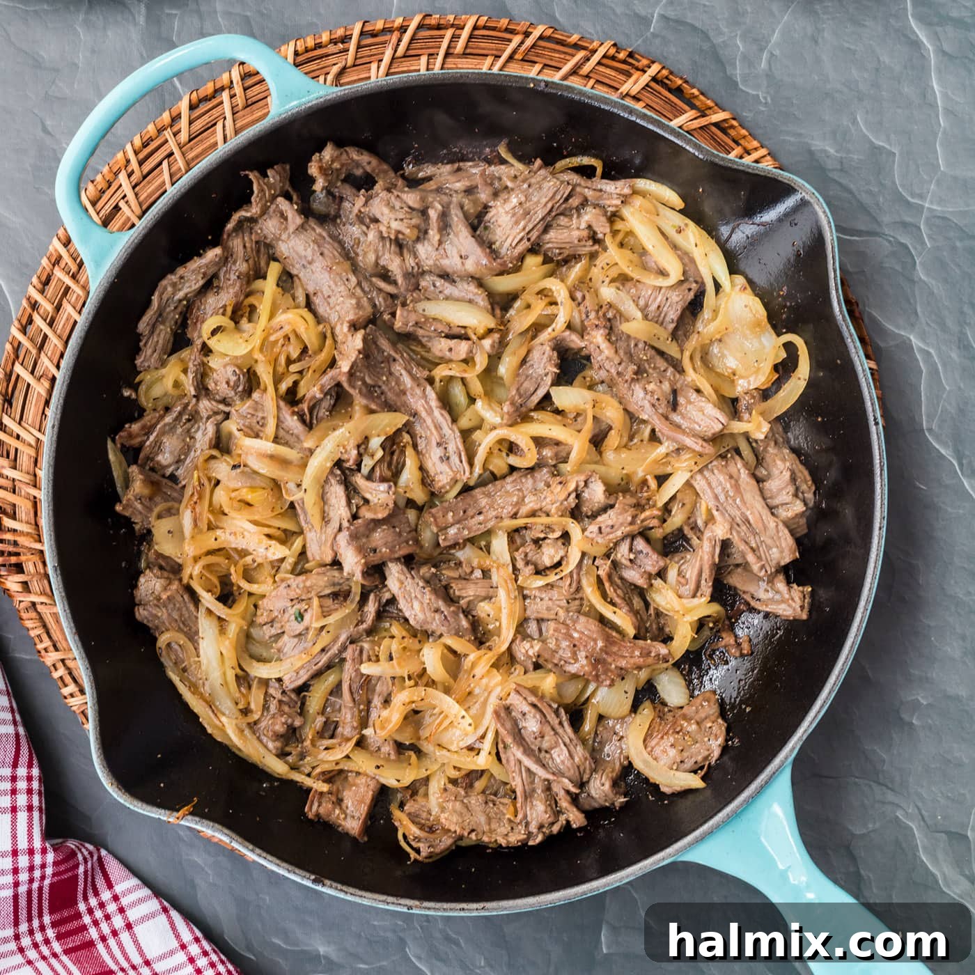 The Quintessential Philly Steak Sandwich 10 philly cheesesteak ingredients in a skillet