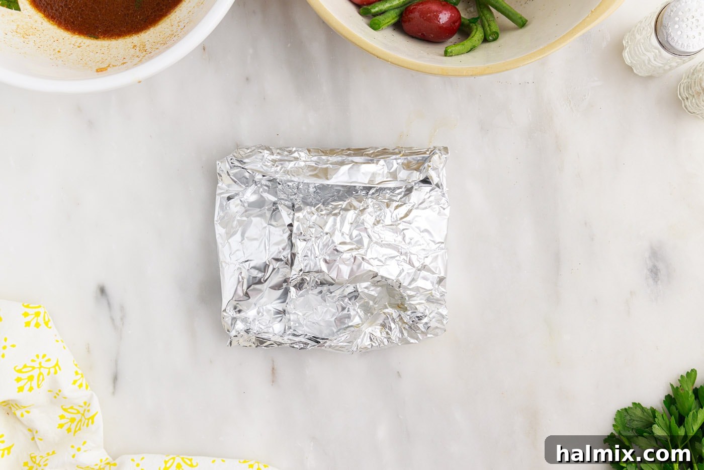 Easy Campfire Foil Meals 11 Completely folded and sealed chicken campfire foil packets