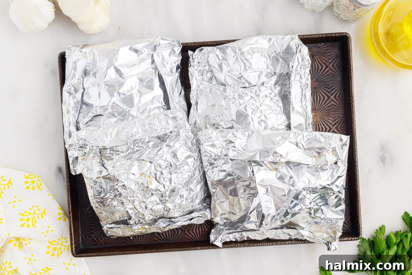 Easy Campfire Foil Meals 12 Campfire foil packets cooking over a grill