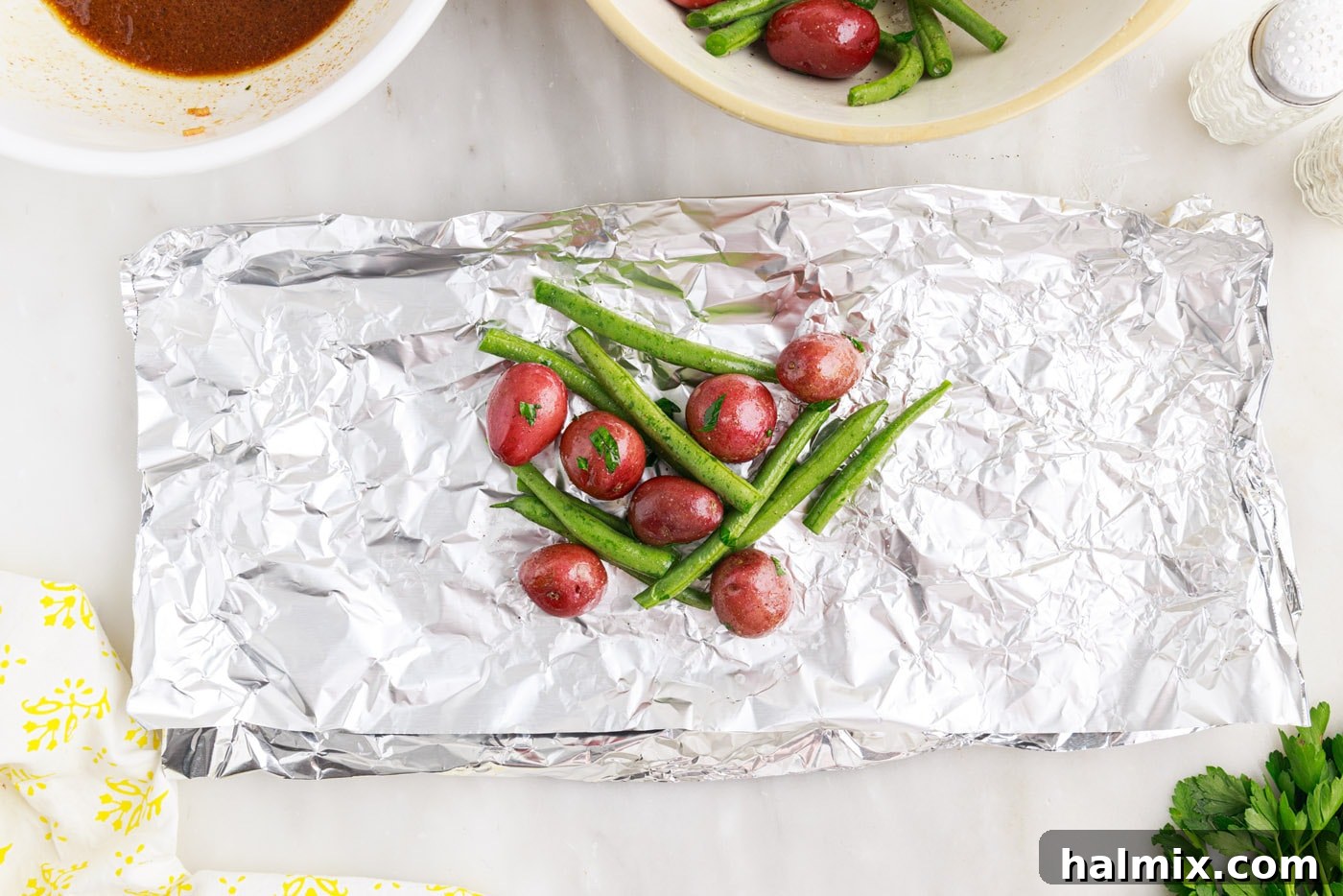 Easy Campfire Foil Meals 8 Green beans and baby potatoes placed in foil