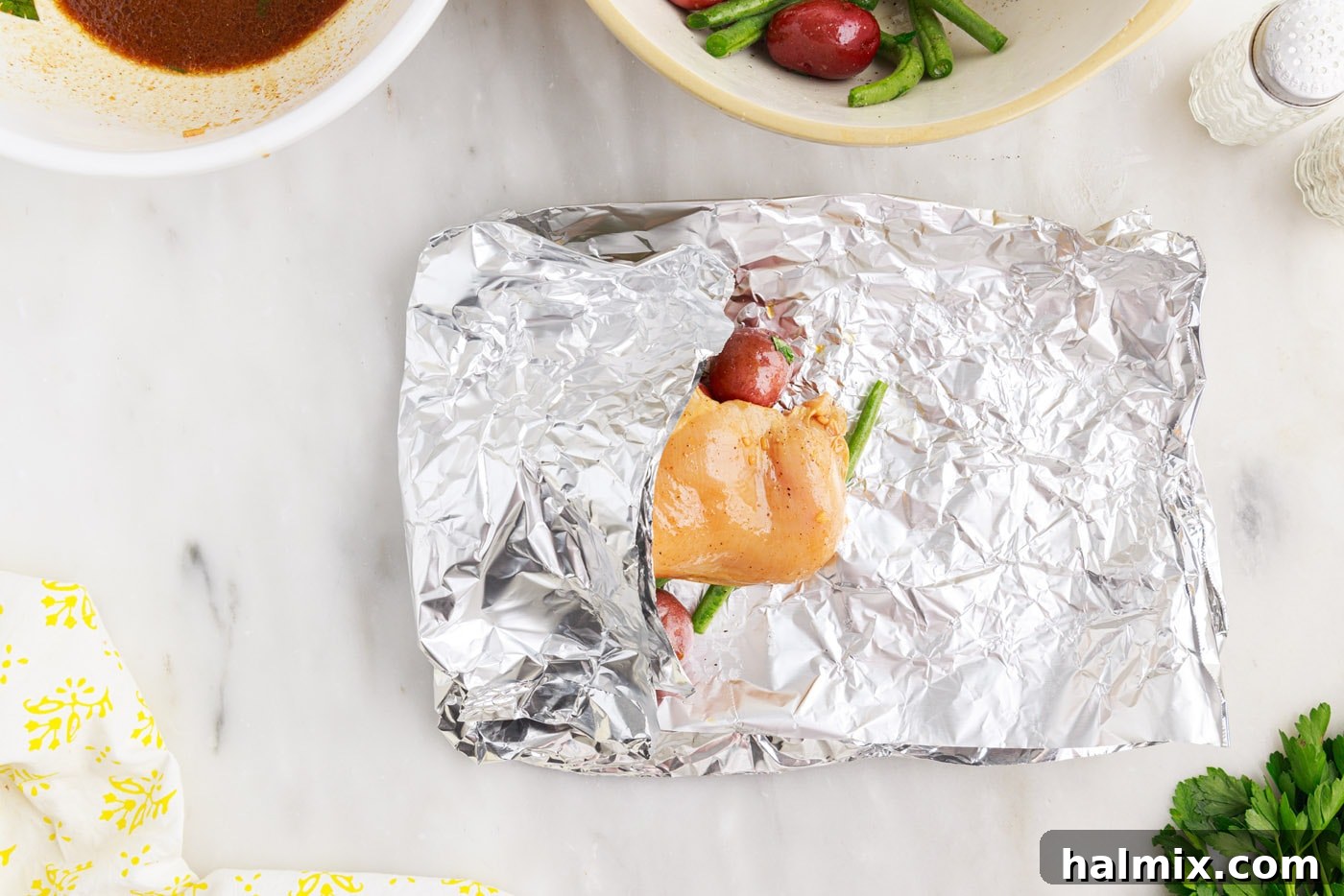 Easy Campfire Foil Meals 10 Partially folded chicken foil packet