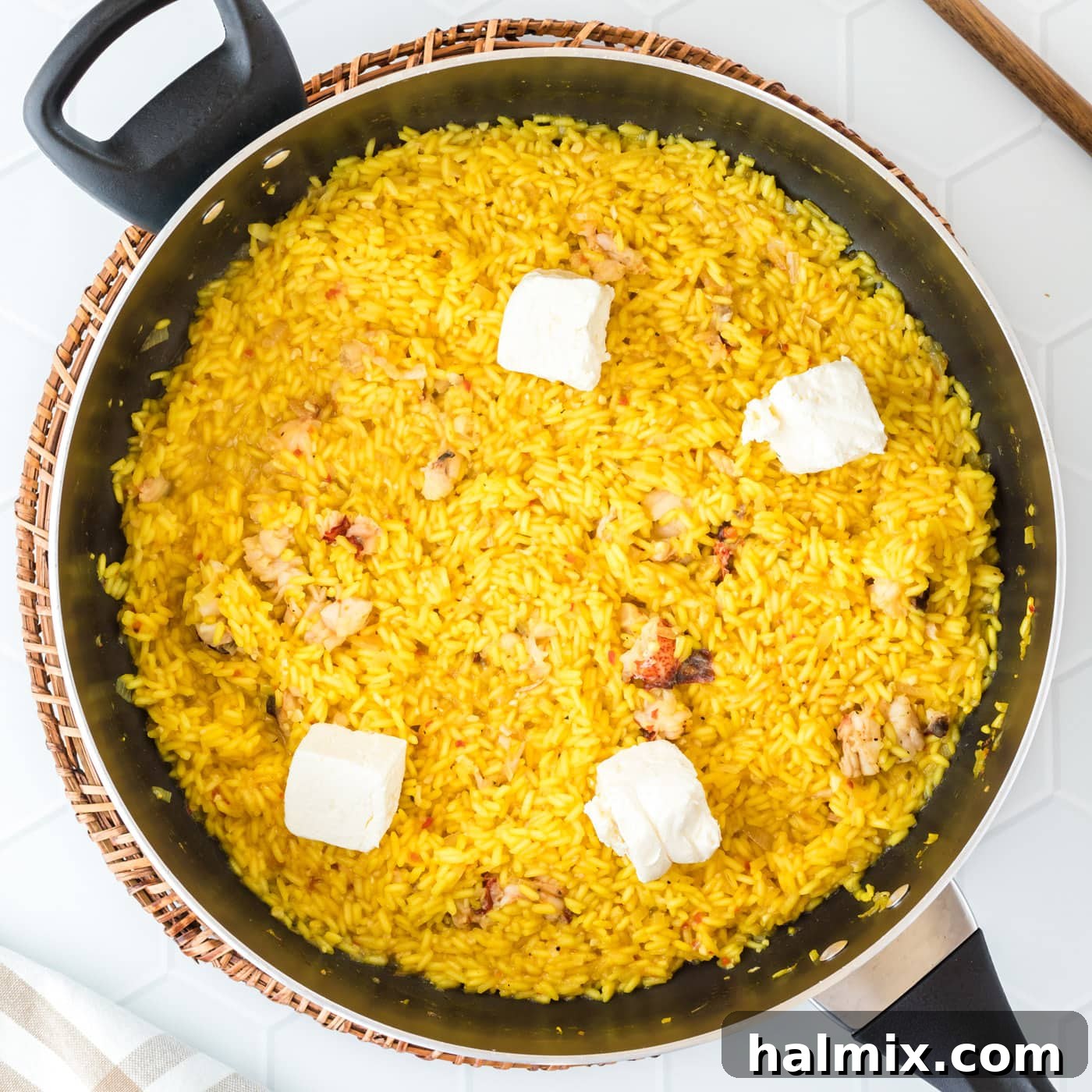 cream cheese on top of lobster risotto