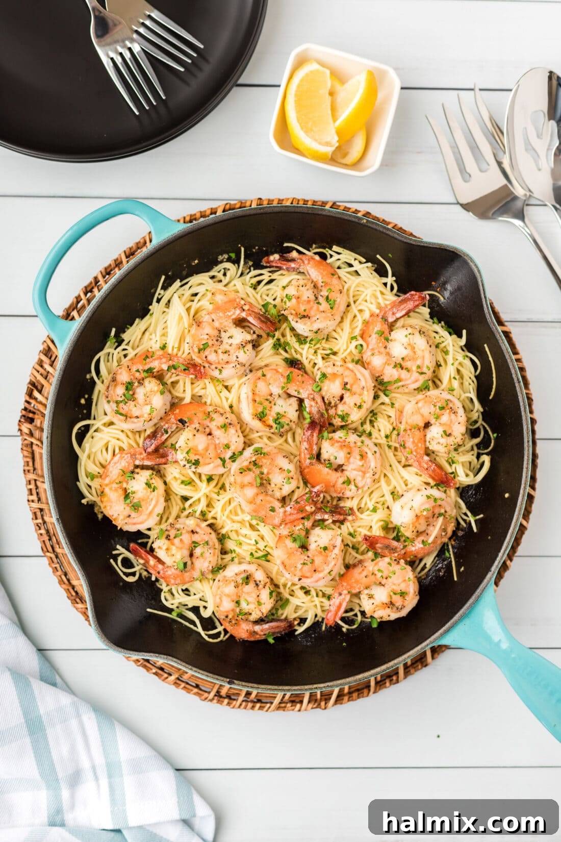 Bright Garlic Shrimp Scampi Pasta 2 skillet of Shrimp Scampi Pasta, glistening with sauce and fresh parsley garnish