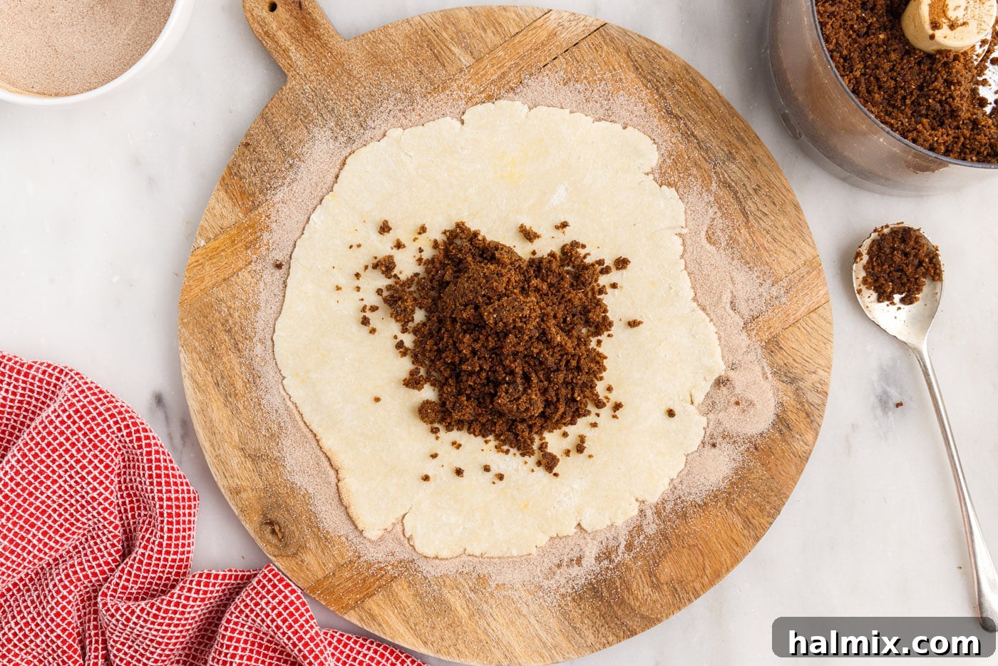 The delicious cinnamon raisin and walnut filling is spread over the rugelach dough, leaving a small border.