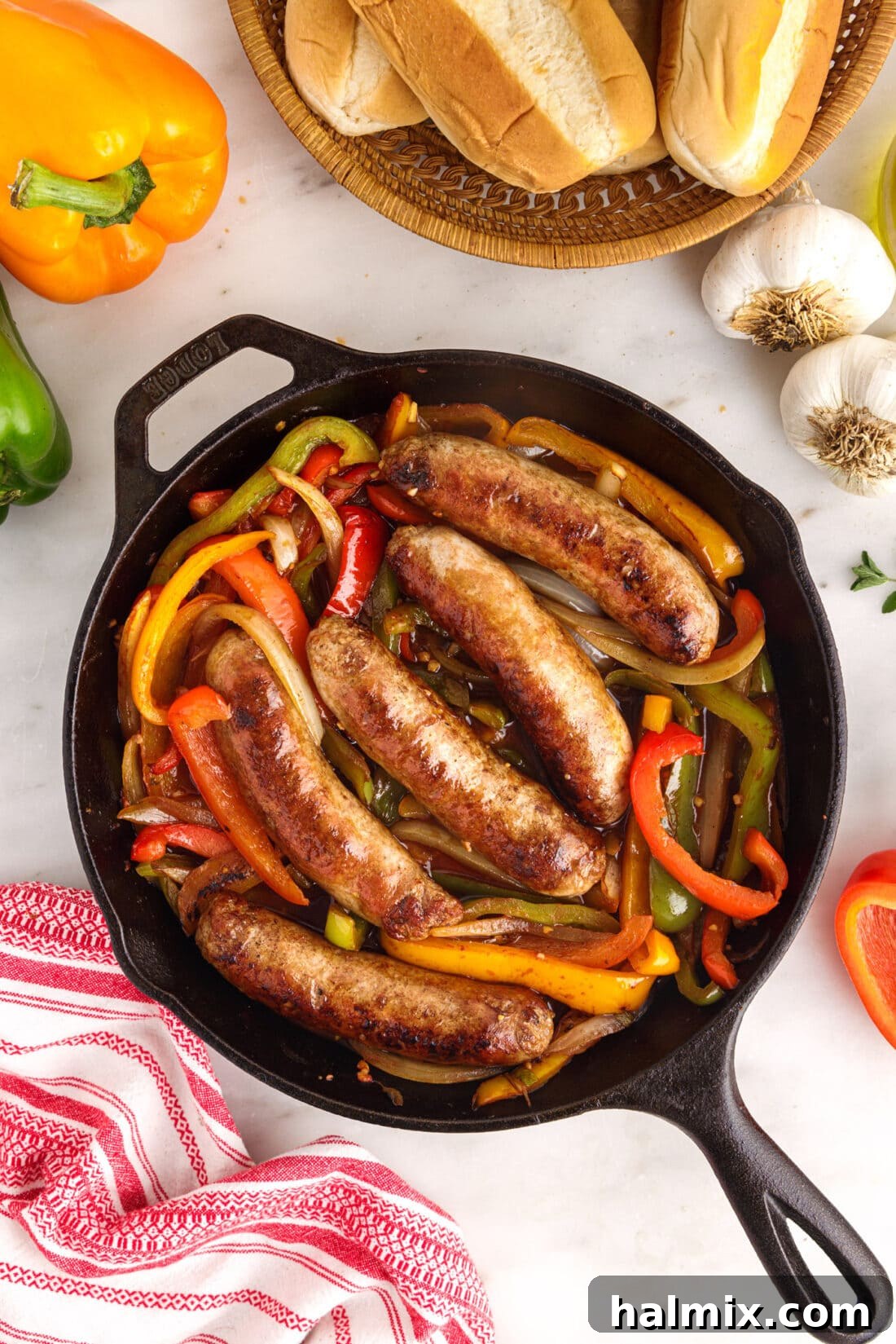 overhead photo of Sausage and Peppers in skillet, vibrant and appetizing