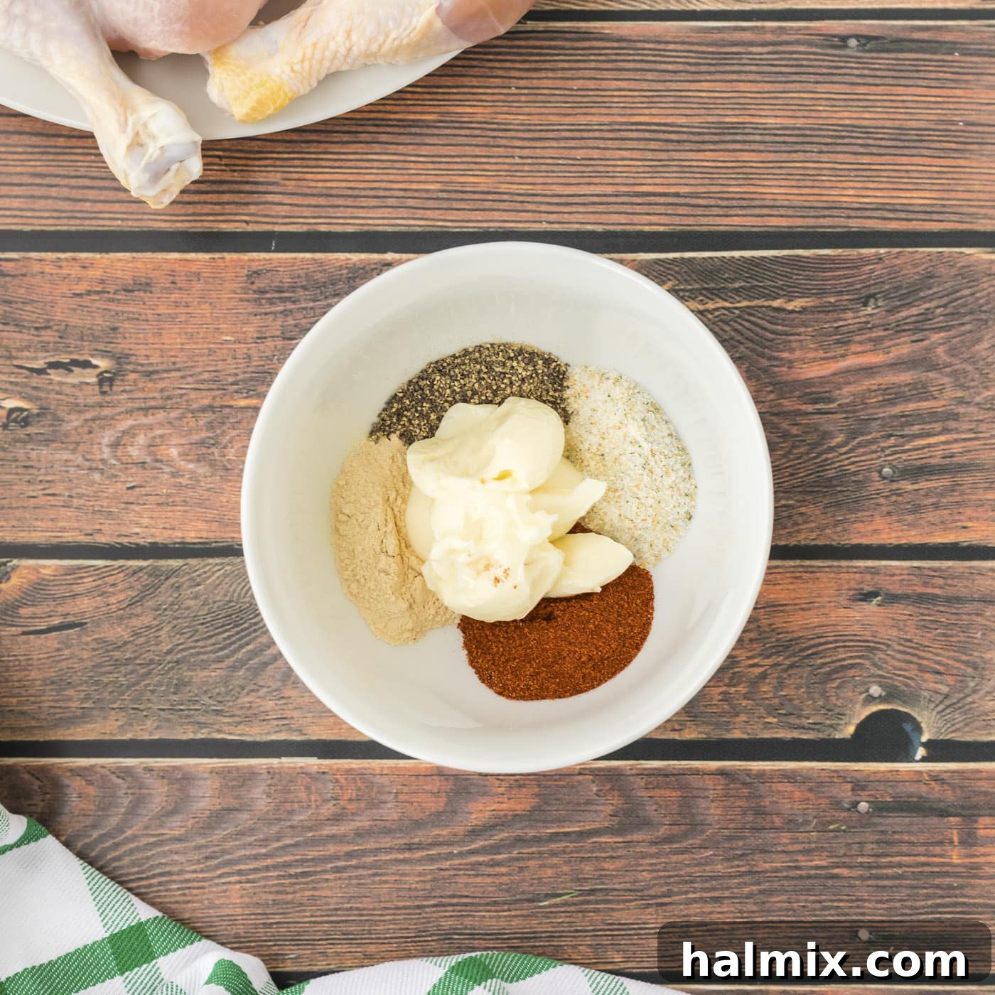 Golden Brown Baked Drumsticks 5 Butter and seasonings in a bowl, ready to be mixed