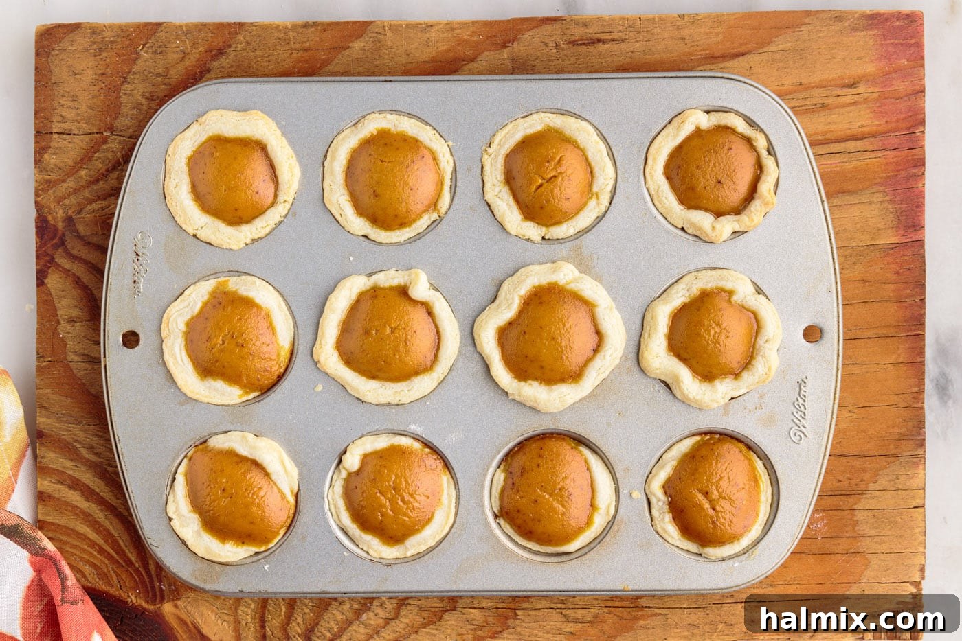 Petite Pumpkin Delights 15 mini pumpkin pies made in a muffin tin
