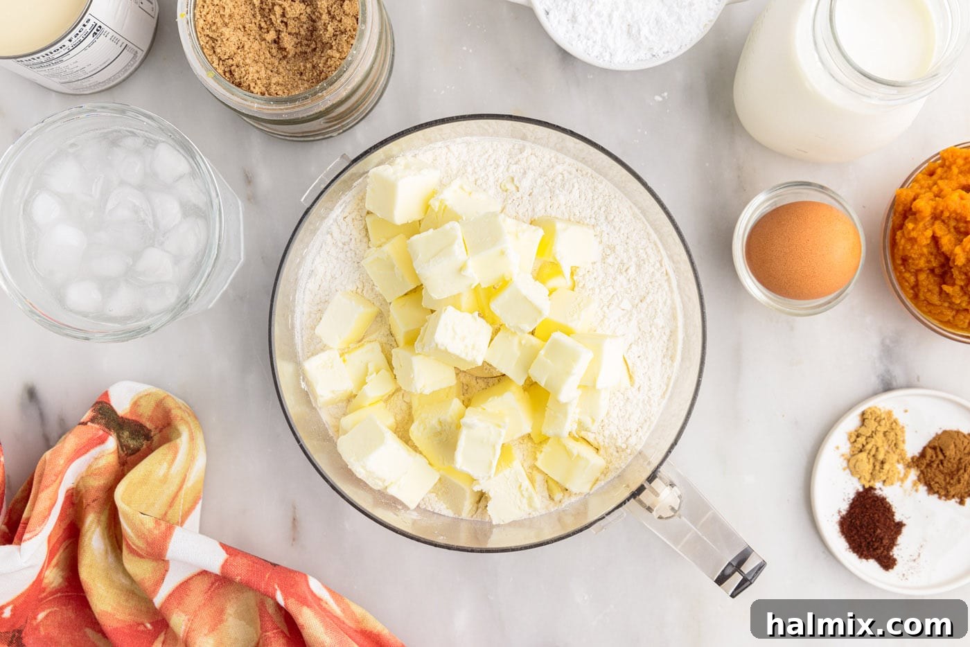 Petite Pumpkin Delights 5 cold butter on top of flour mixture in food processor