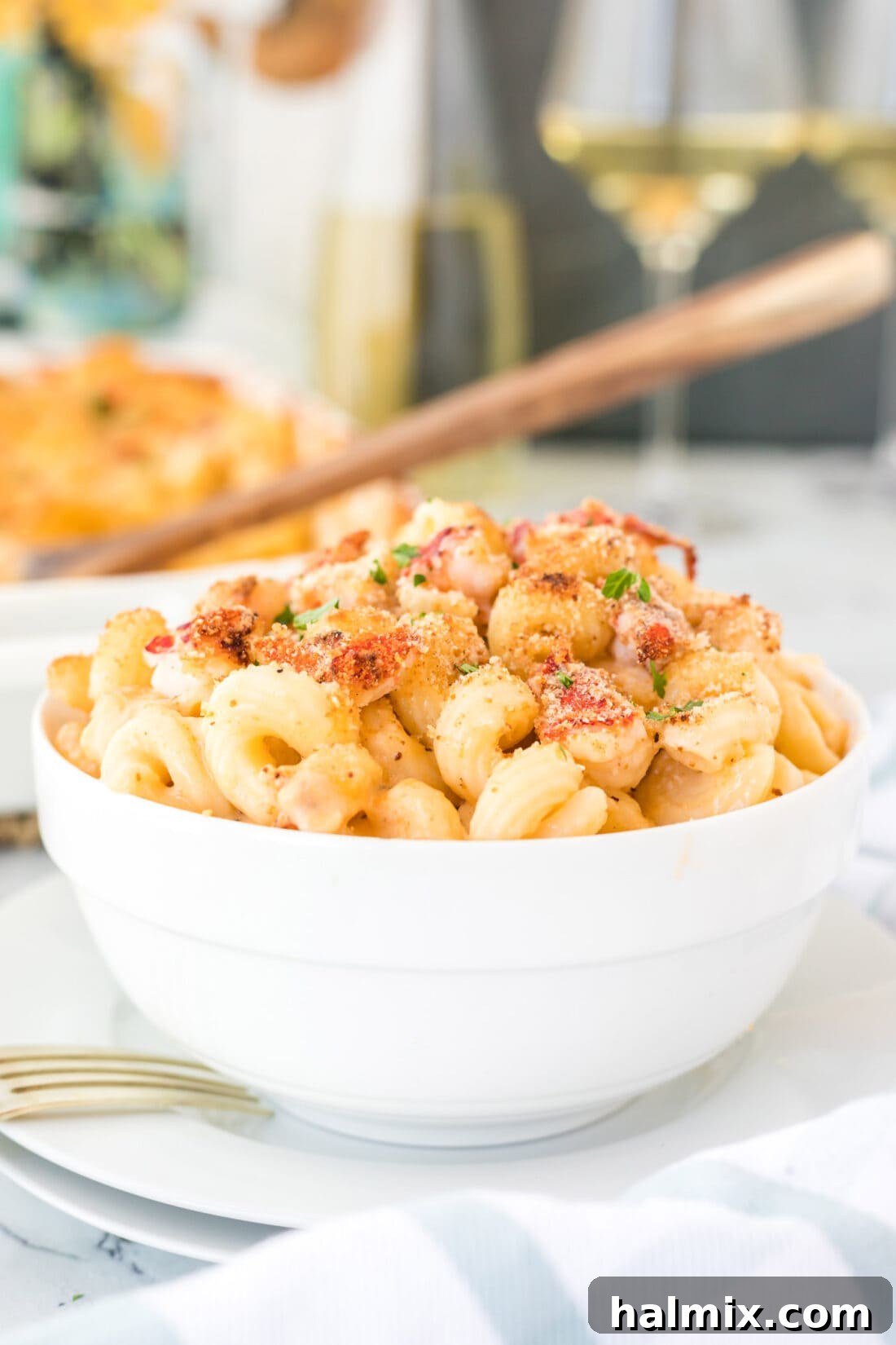 bowl of Lobster Mac and Cheese, garnished and ready to eat