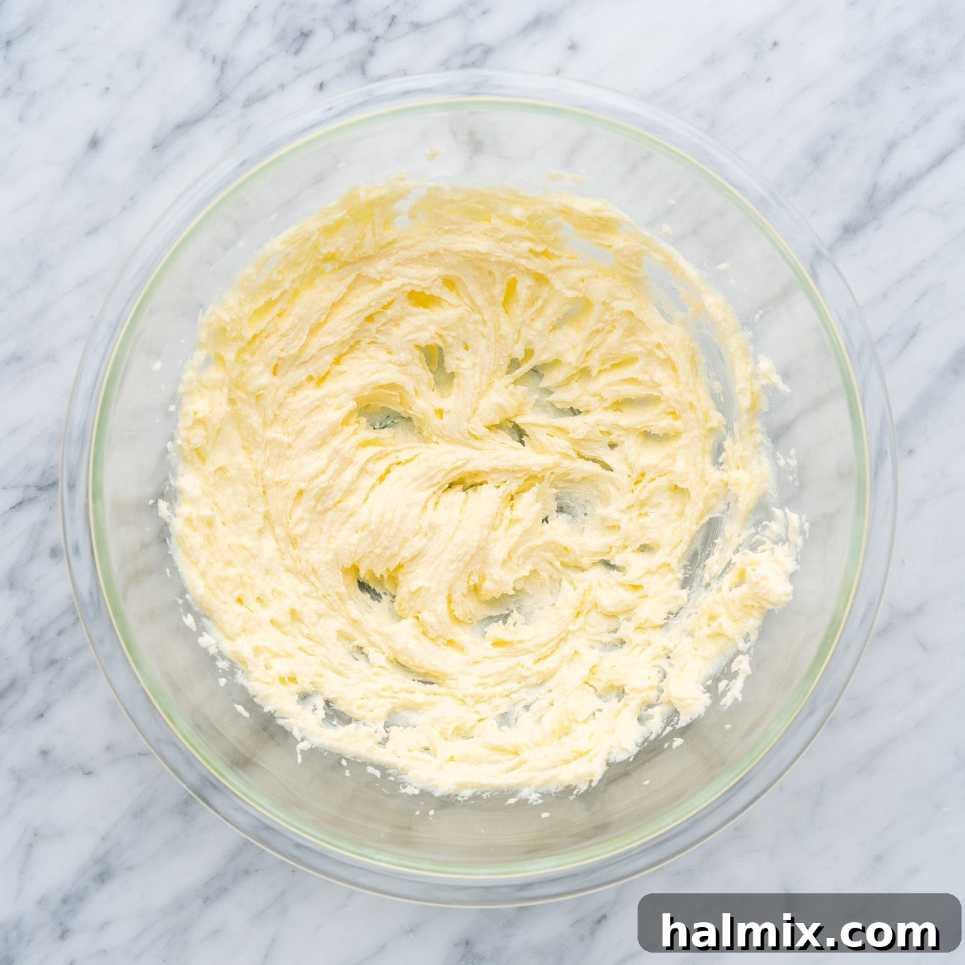 Spiced Apple Caramel Cheesecake Bars 6 butter and sugar cream together in a bowl