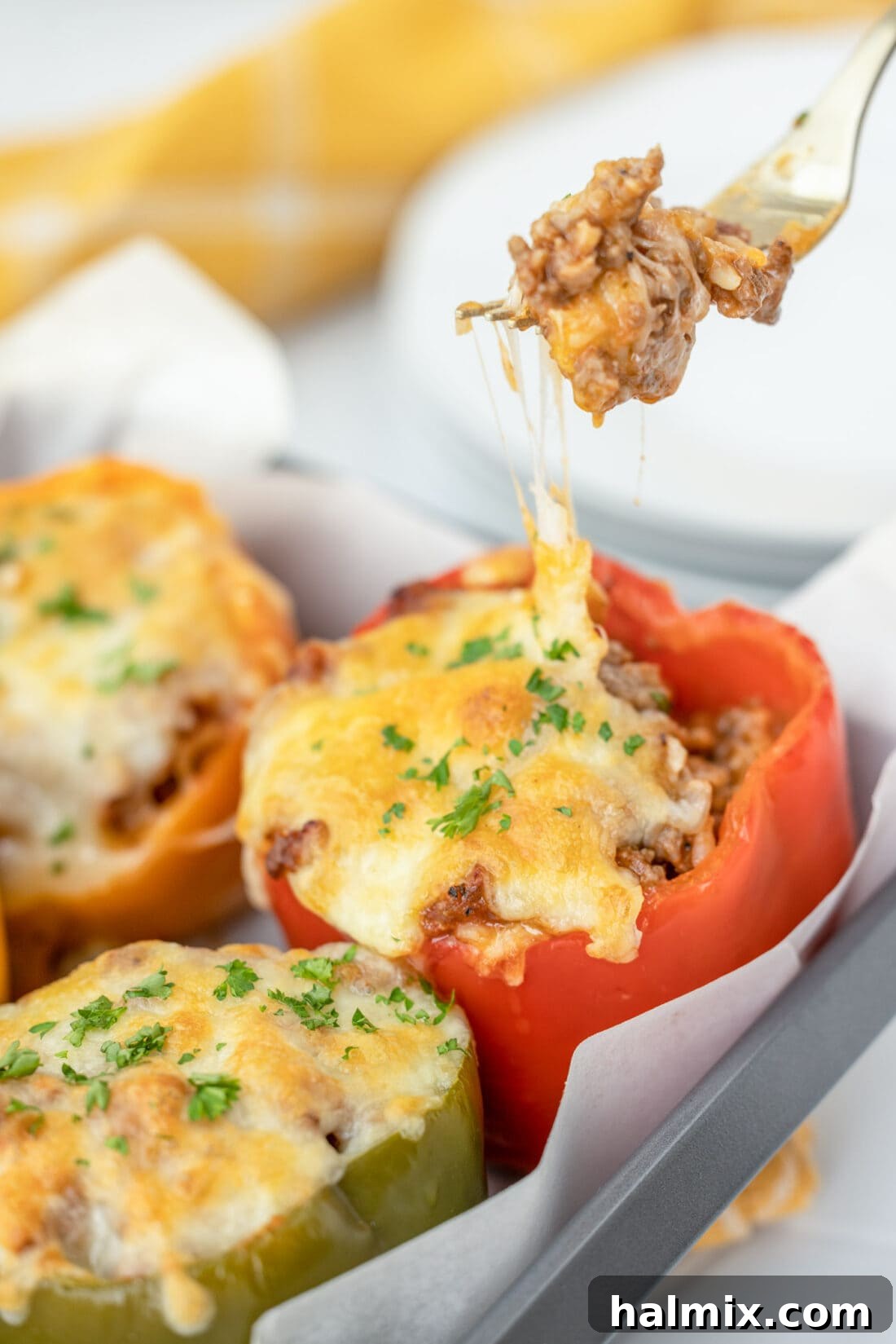 Savory Stuffed Peppers 11 Fork full of delicious stuffed pepper, showcasing the savory filling and melted cheese