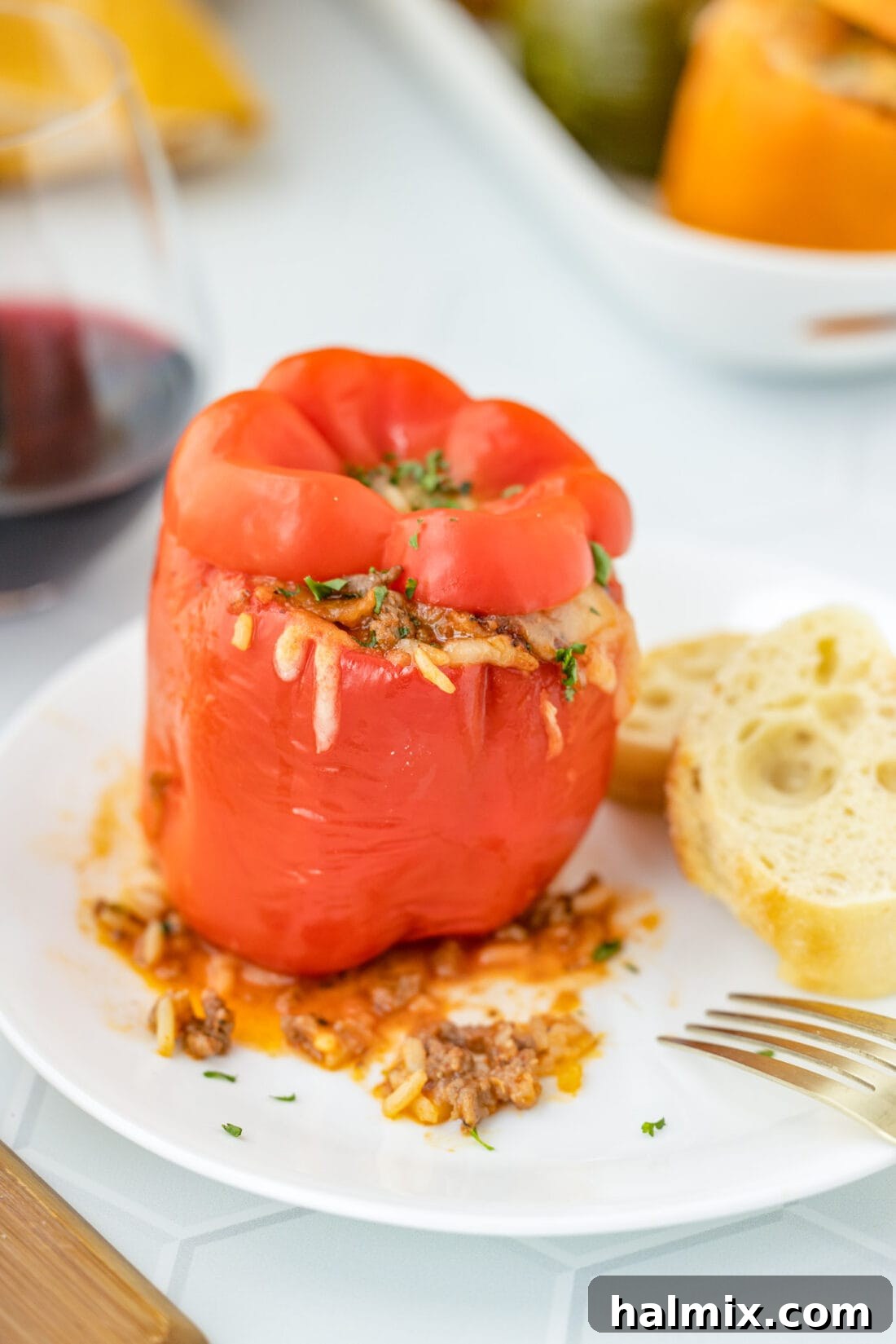 Savory Stuffed Peppers 3 A single stuffed bell pepper with its top on, ready to be served