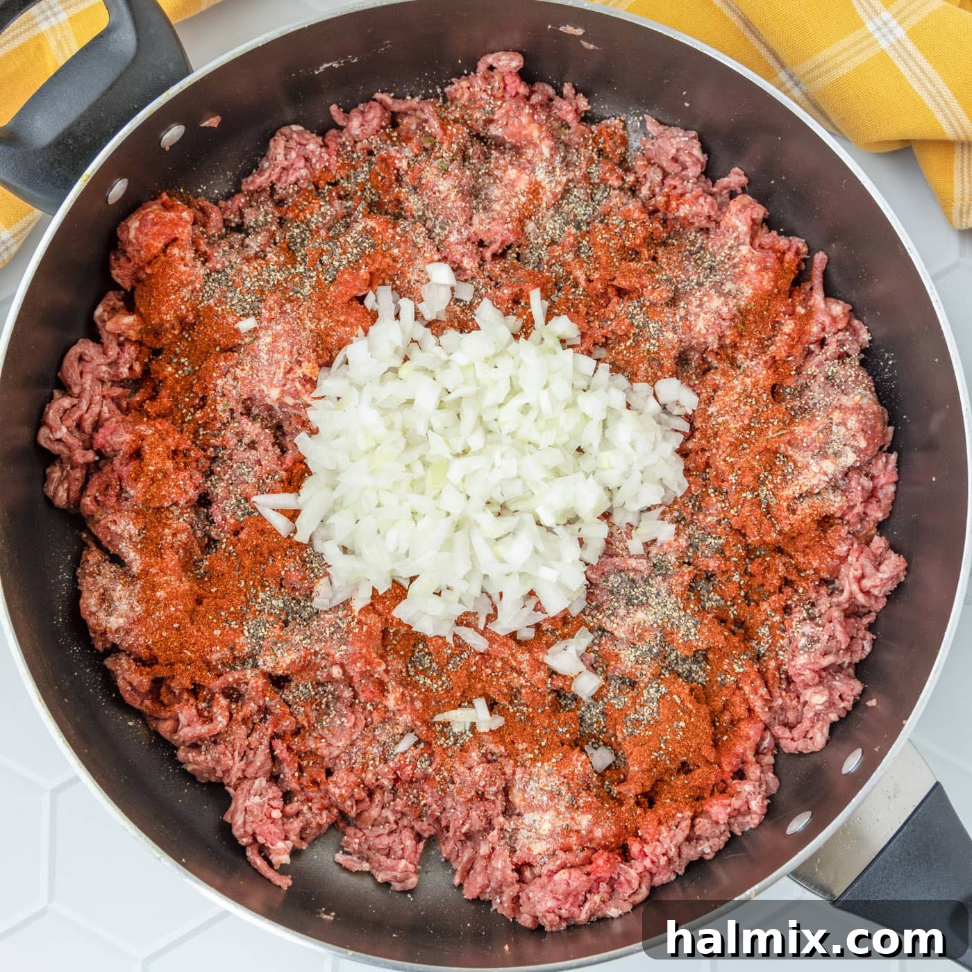 Savory Stuffed Peppers 6 Italian sausage, ground beef, onions, and seasoning browning in a skillet, sizzling