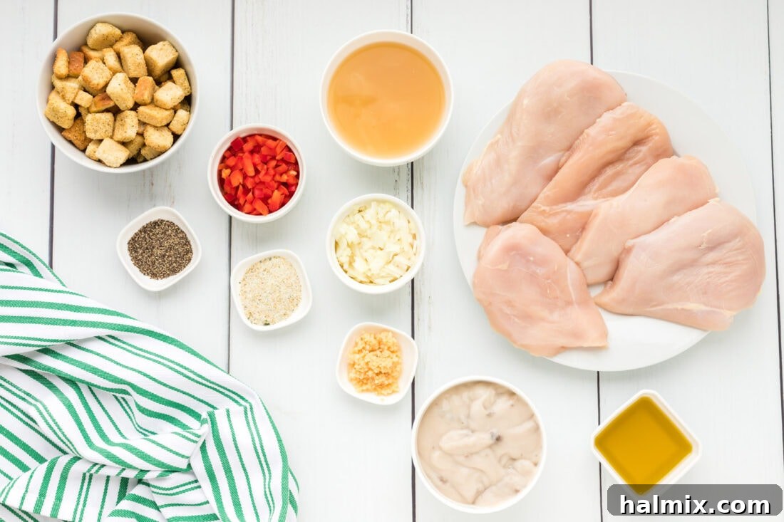 Perfectly Stuffed Chicken Roulade 4 Ingredients laid out for Stuffed Chicken Breast preparation, including bell peppers, onion, garlic, chicken breasts, and seasonings