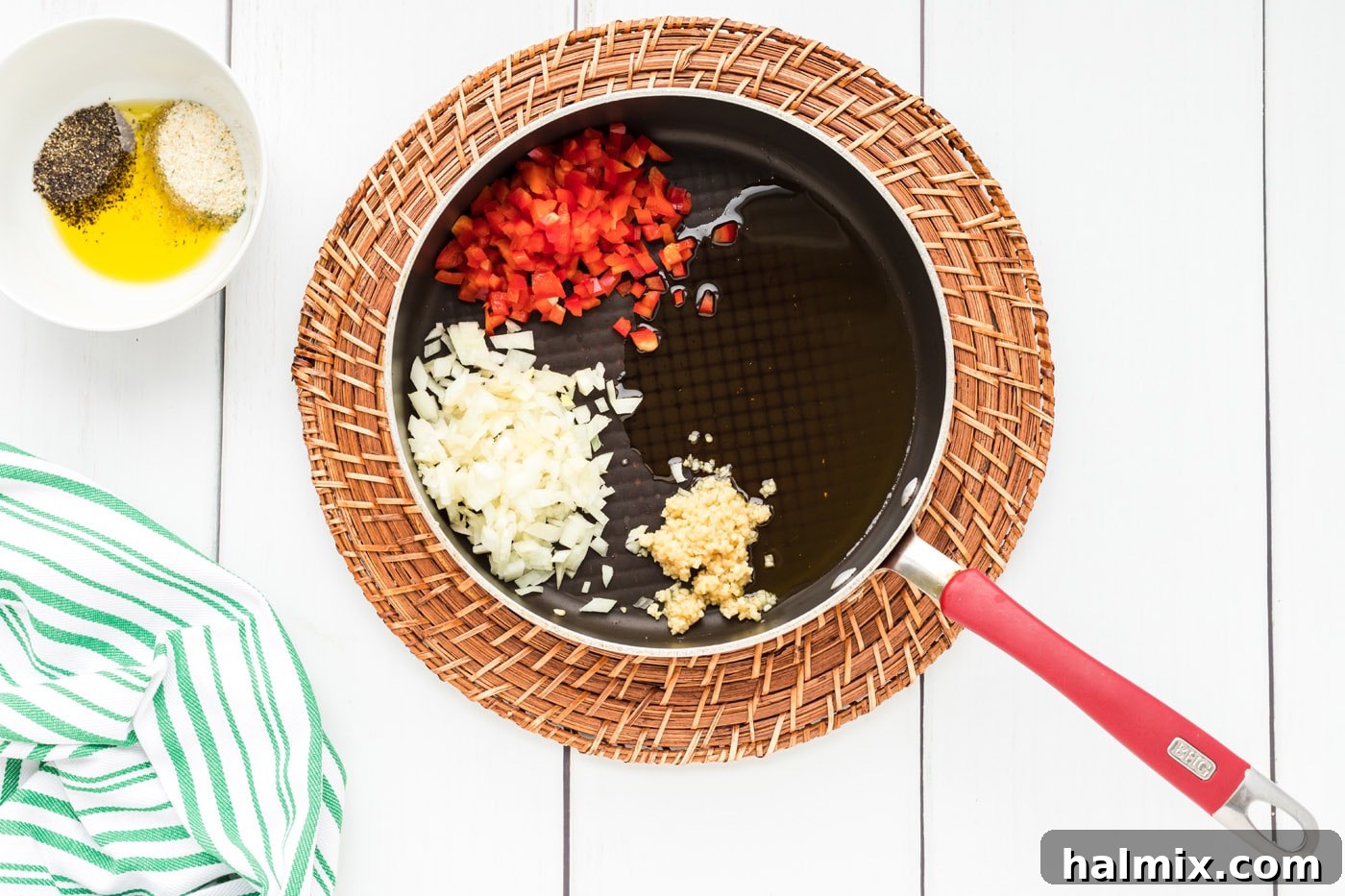 Perfectly Stuffed Chicken Roulade 5 Red bell pepper, garlic, and onion gently sizzling in a skillet with olive oil