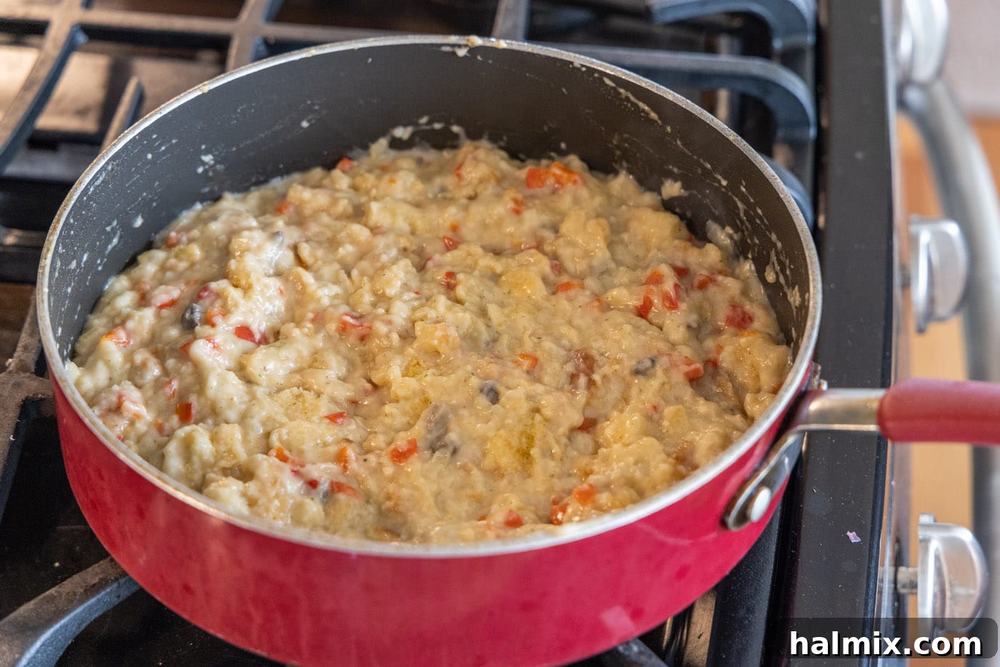 Perfectly Stuffed Chicken Roulade 6 Savory stuffed chicken breast filling bubbling gently in a skillet