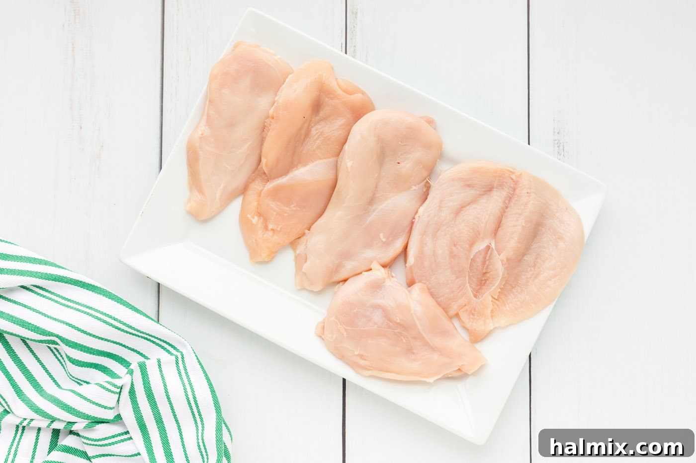 Perfectly Stuffed Chicken Roulade 8 Skillfully butterflied chicken breast laid open like a book on a cutting board