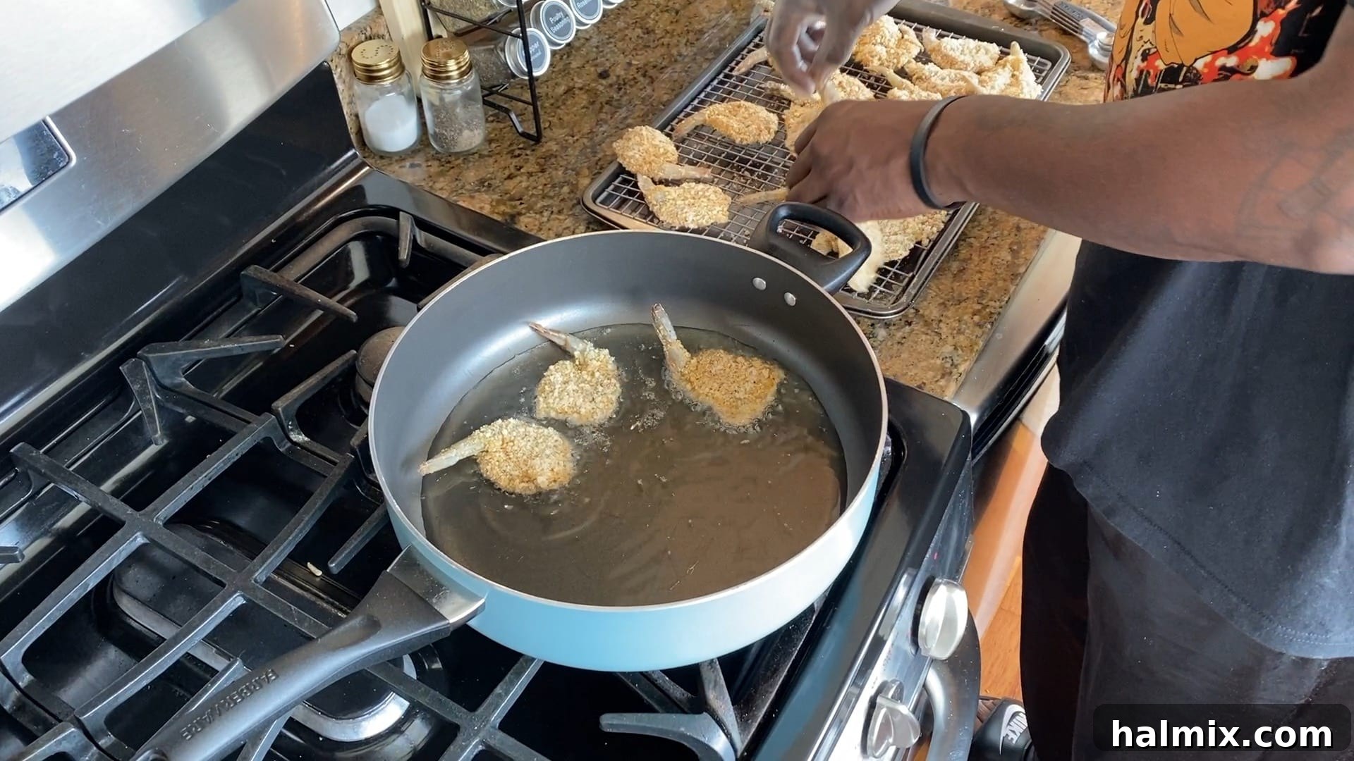Hot oil shimmering in a skillet, ready for frying