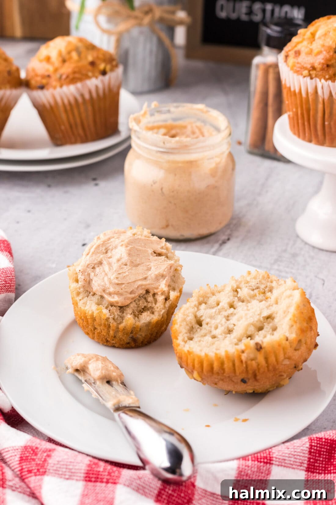 Creamy Cinnamon Honey Butter spread generously on a toasted muffin