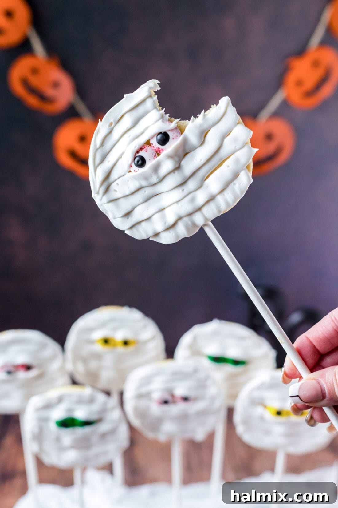 Close-up of a Mummy Cookie with a bite taken out, showing the inside