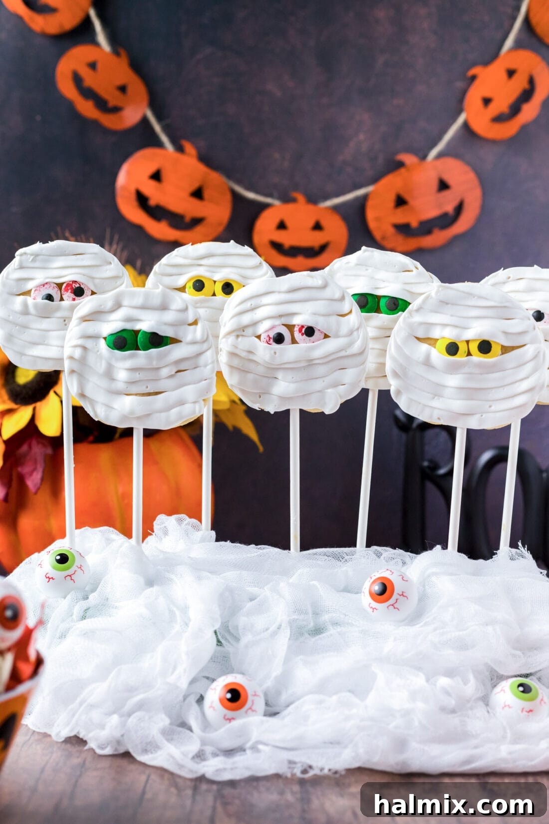 A collection of decorated Mummy Cookies displayed for Halloween
