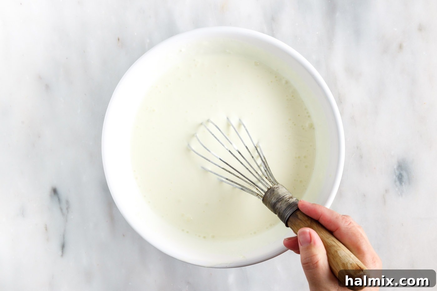 Rainbow Ripple Gelatin Pie 12 Whisking lemon jello with Cool Whip to create a smooth, light mixture for the second pie layer.