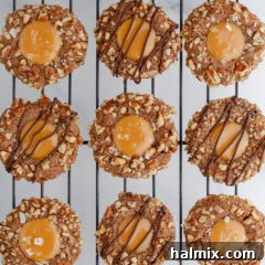 Turtle Thumbprint Cookies on a wire rack