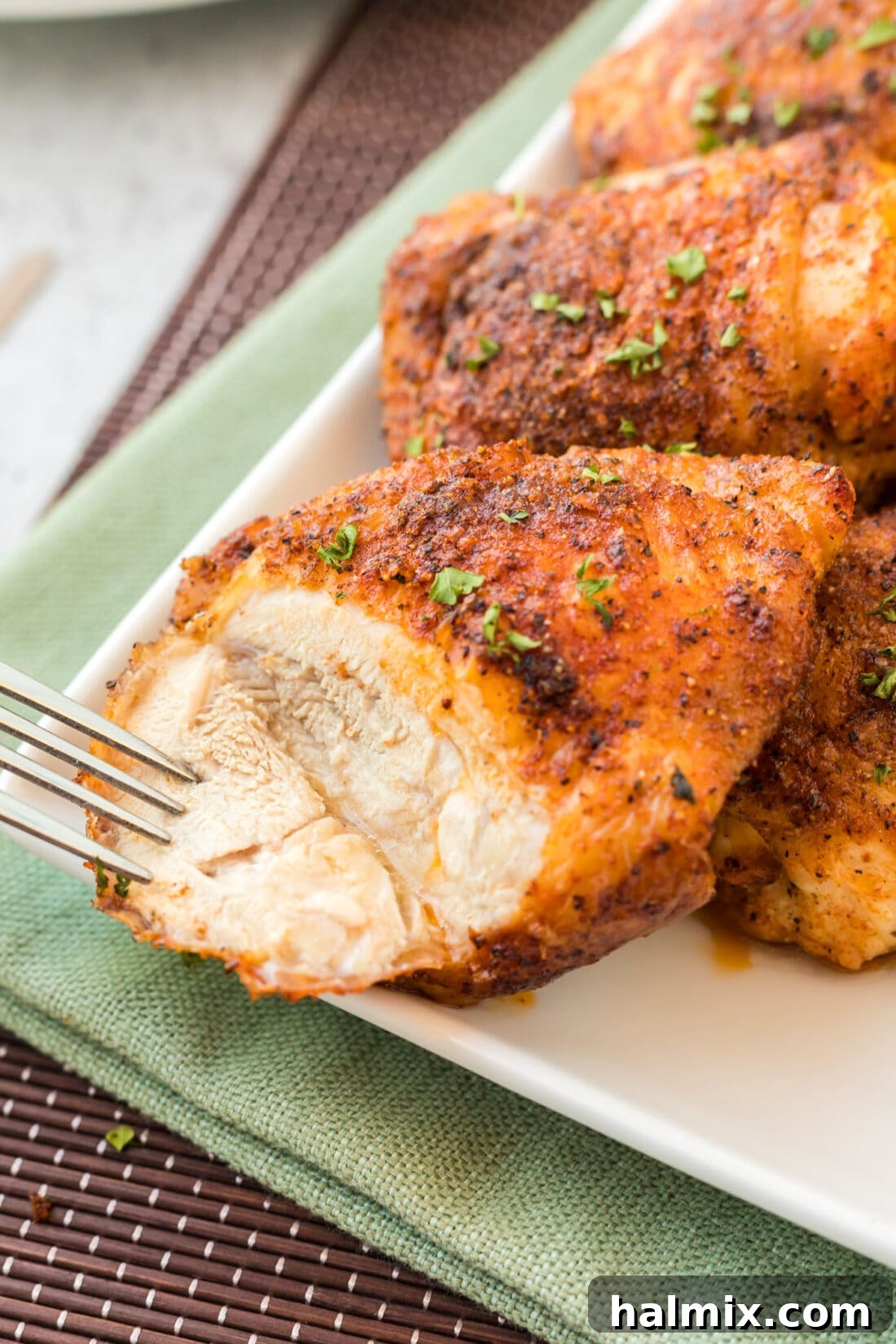 Crispy Golden Baked Chicken Thighs 3 Baked Chicken Thigh with a cut in it
