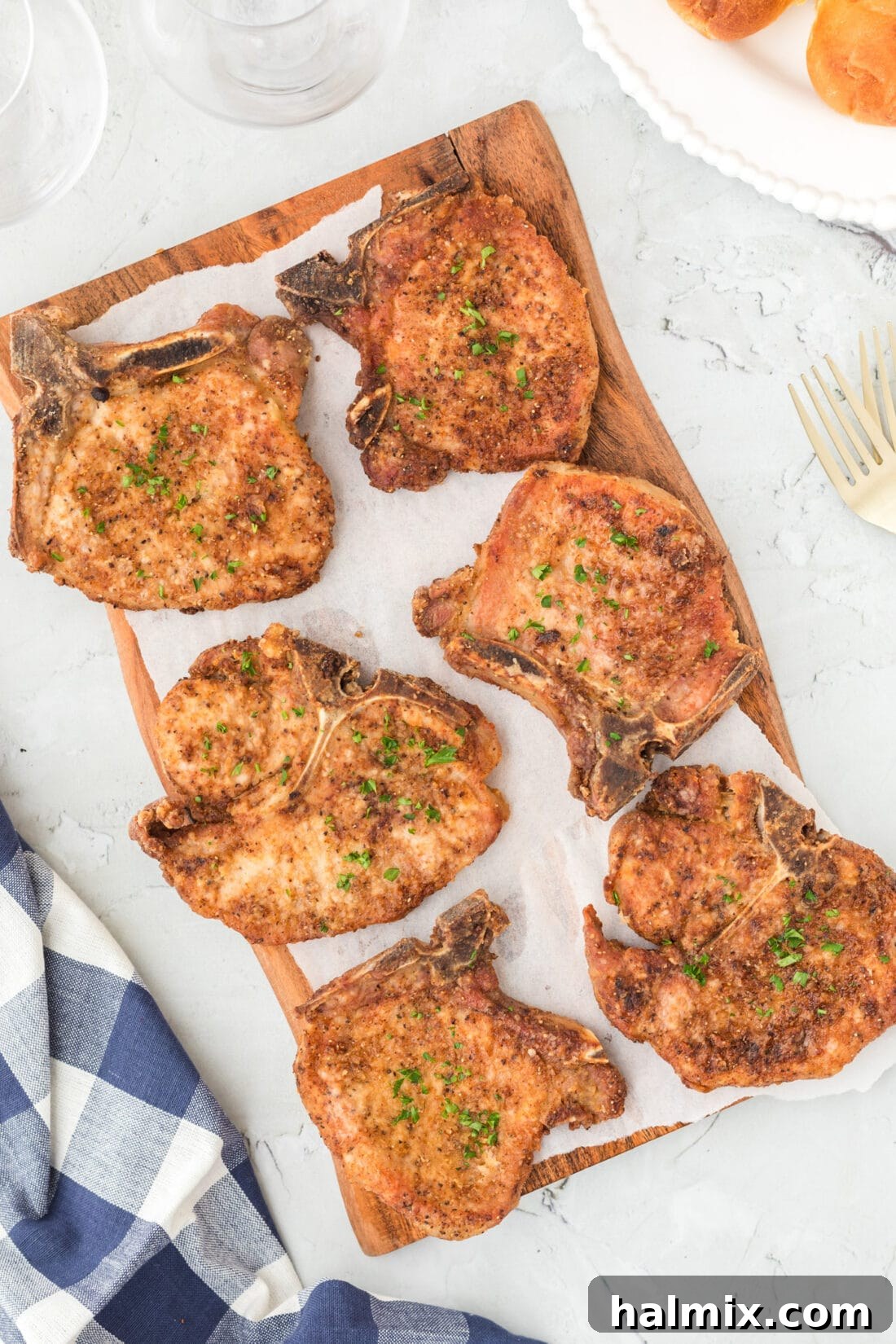 Platter of Golden Brown Pan-Fried Pork Chops Ready to Serve
