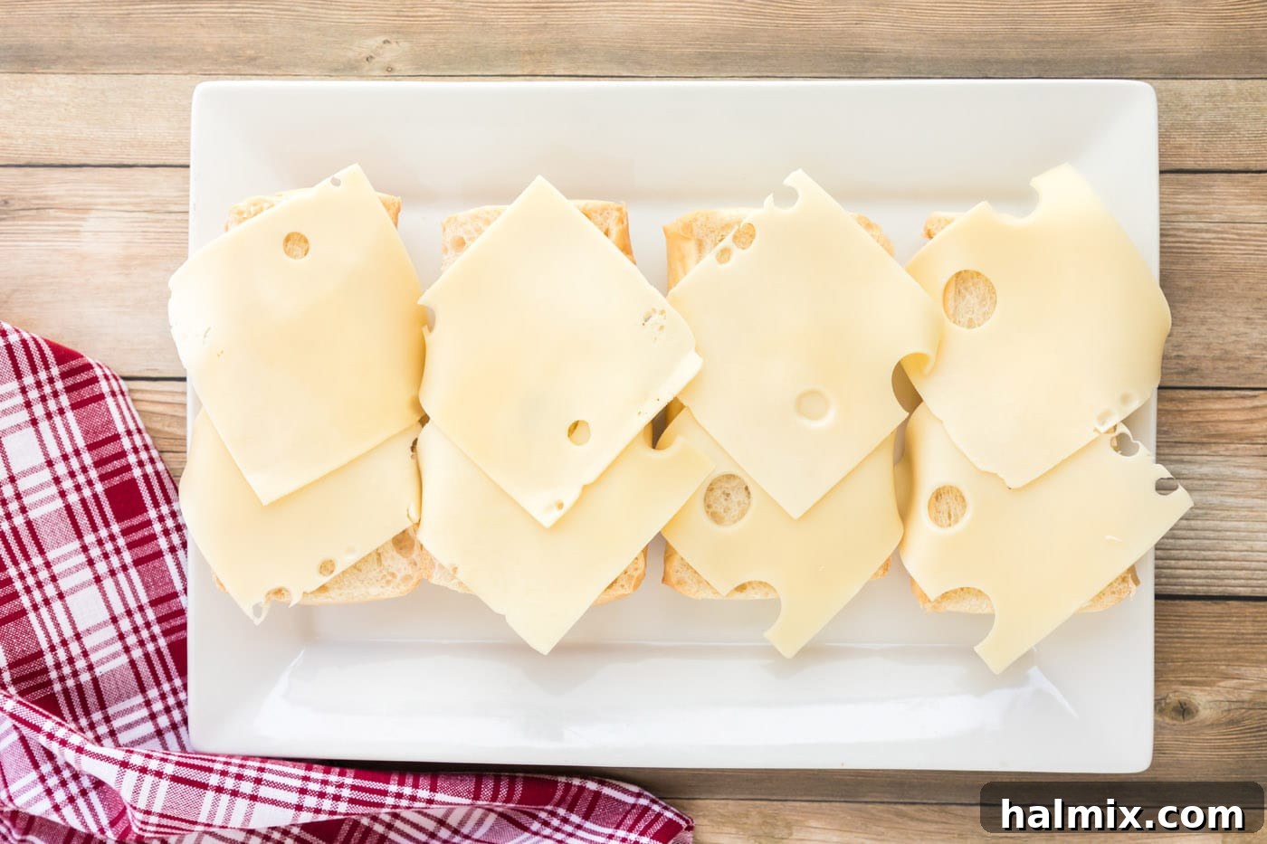 Swiss cheese on top of cuban bread