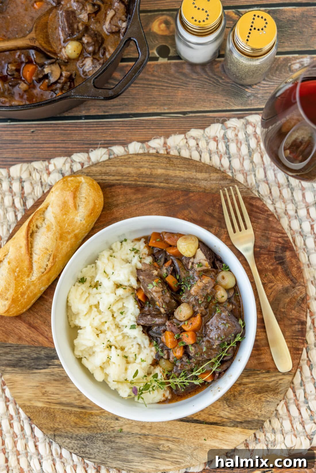 bowl of Beef Bourguignon with creamy mashed potatoes, ready to be enjoyed