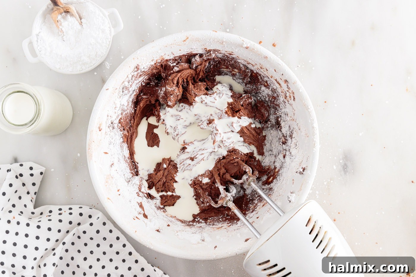 hand mixer incorporating chocolate frosting ingredients