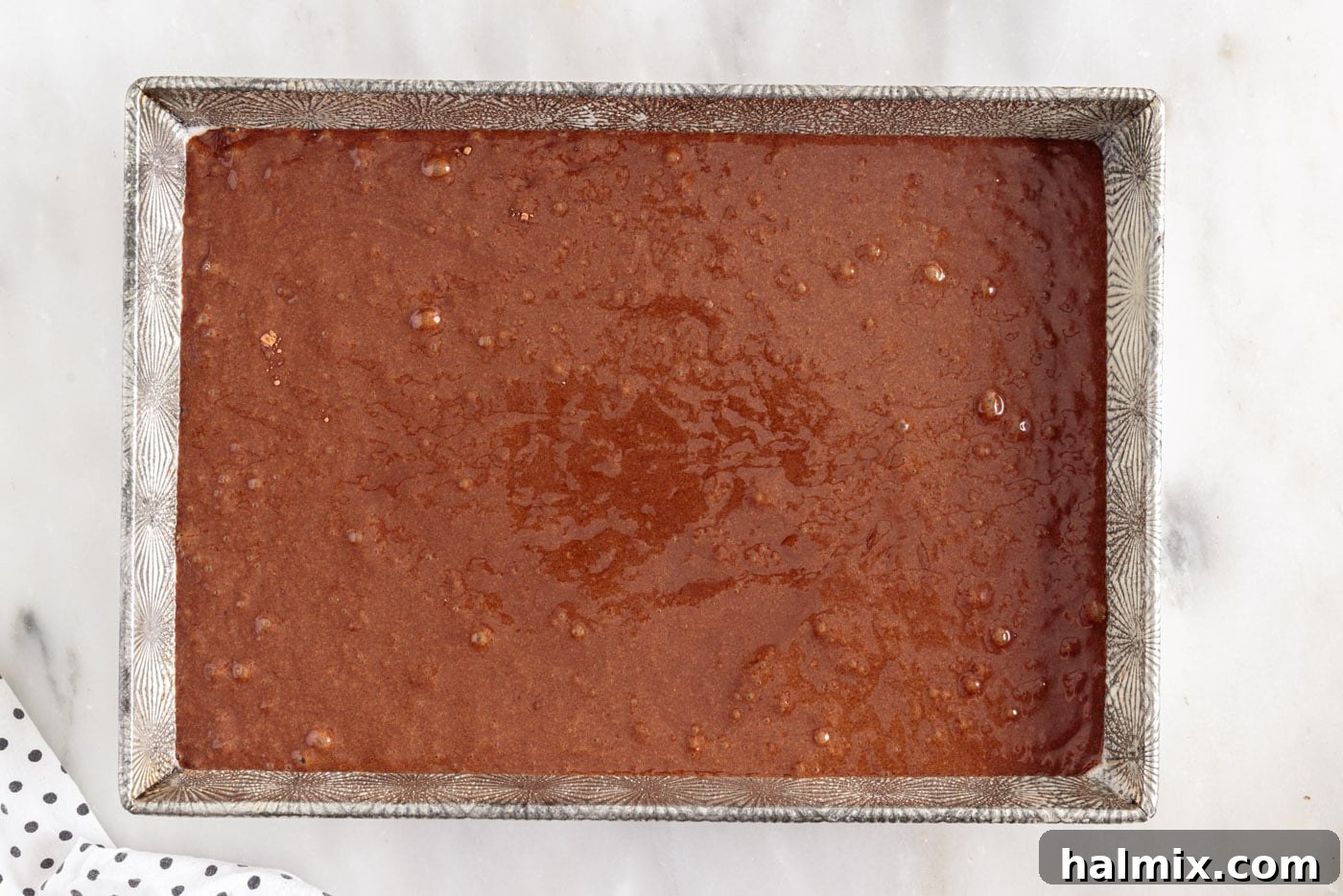 chocolate mayonnaise cake batter in a baking dish