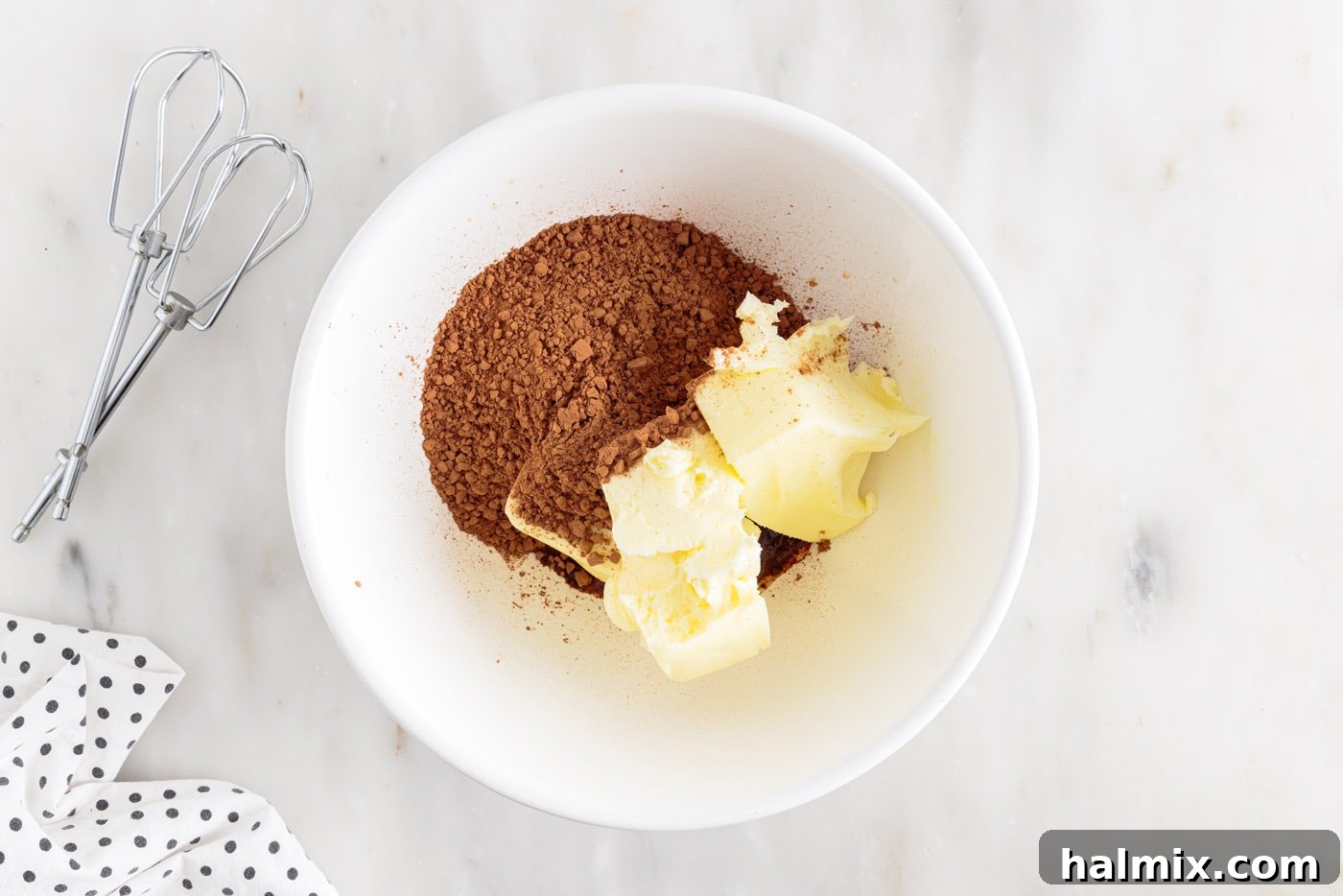 butter and cocoa powder in a mixing bowl