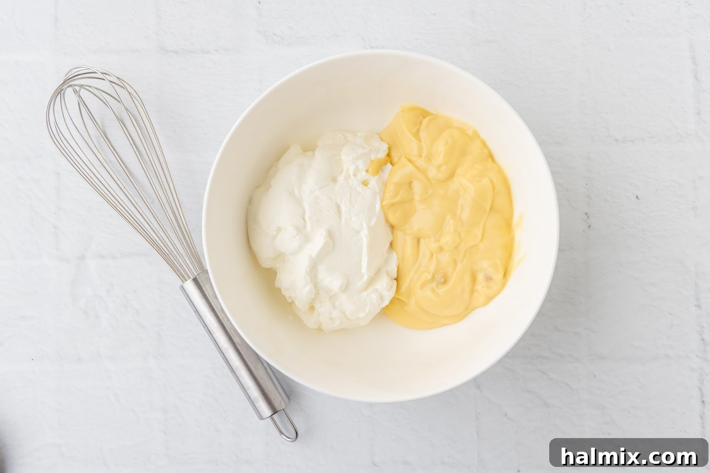 Comfort Potato Bake 8 cream of chicken soup and sour cream in a bowl