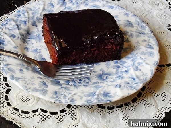 Rich chocolate prune cake with a luscious caramel glaze, perfect for a comforting dessert.