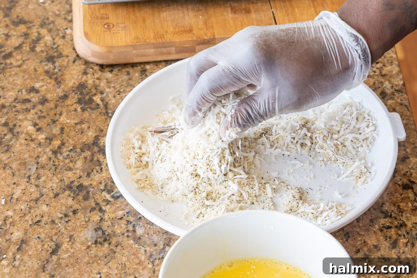 hand coating coconut shrimp