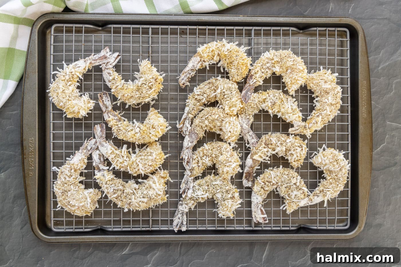 coconut shrimp on a wire baking sheet