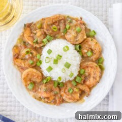 Bowl of Shrimp Etouffee with rice, a perfect serving presentation.